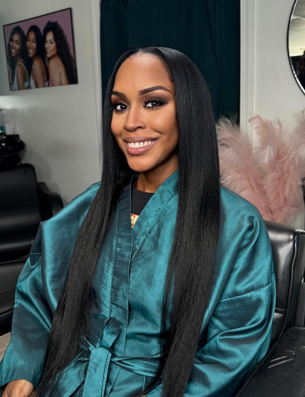 Client sew-in with a center part and very long straight length